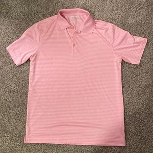 Medium pink and white striped white Nike golf shirt.